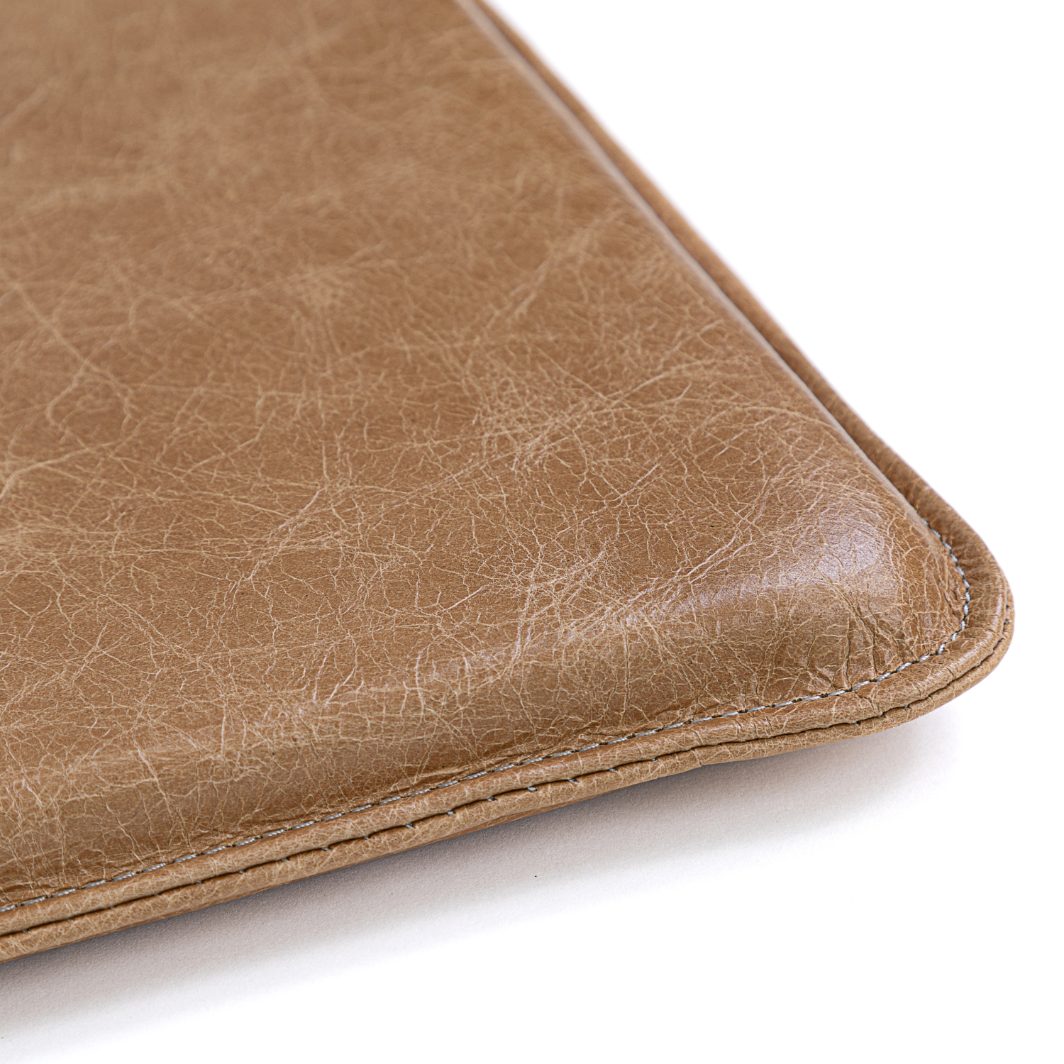 Tan leather cushion